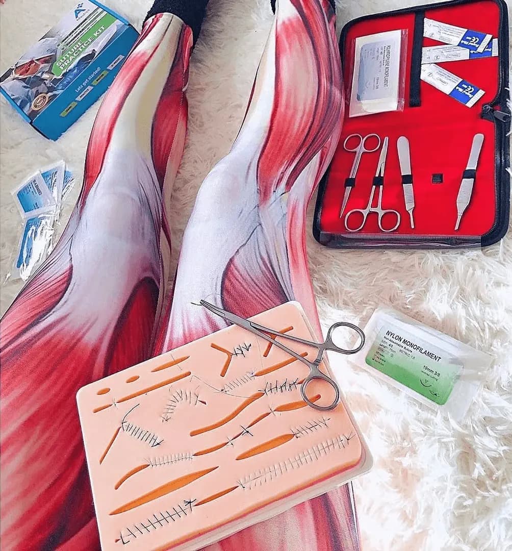 artsy student suture skills on suture pad